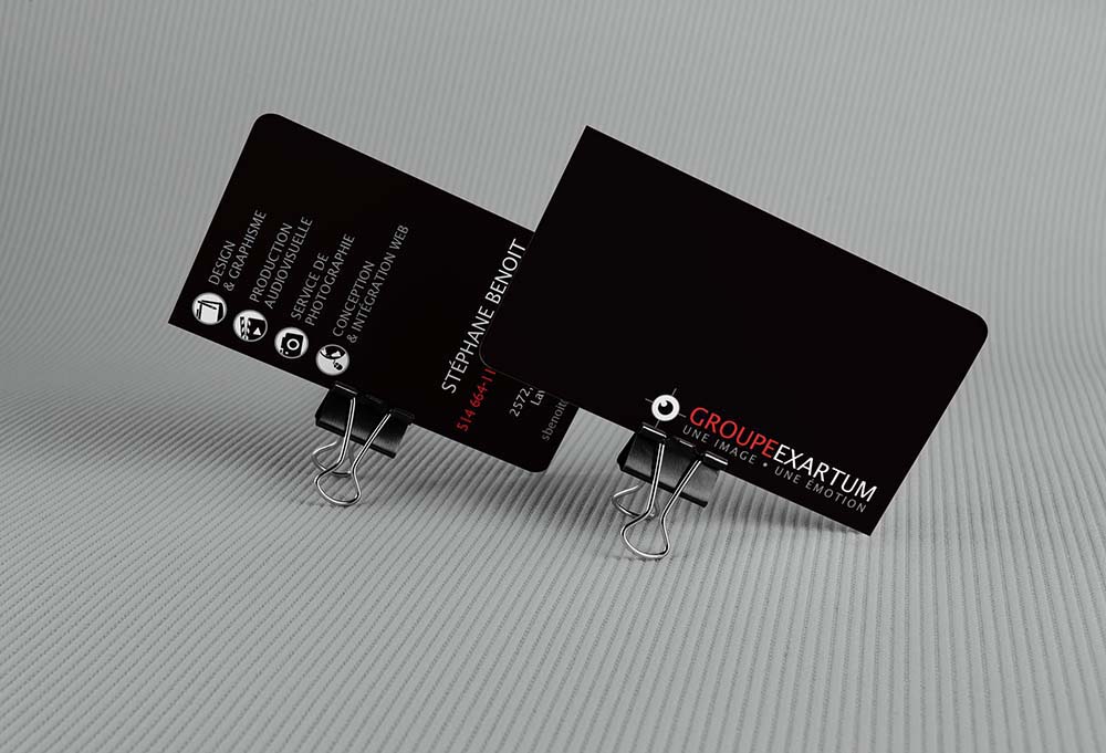 Two blank business card on color background.